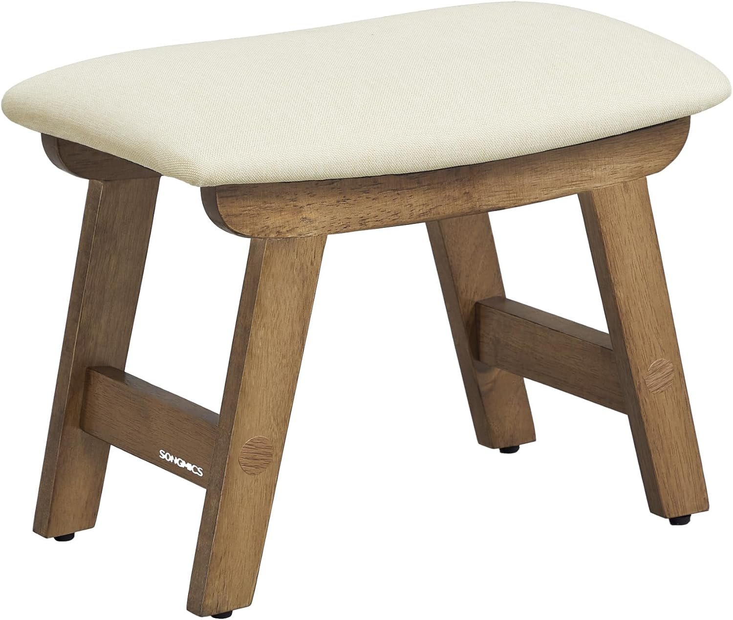 Padded foot rest under desk, solid wood frame, removable cover, for living room.