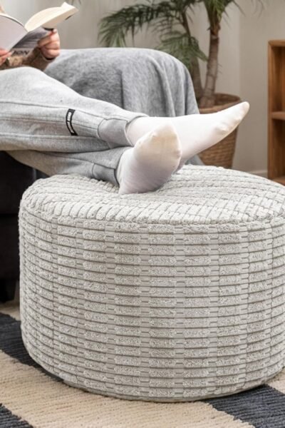 Round ottoman pouf foot stool, all-one-foam construction, removable cover, for living room bedroom dorm.